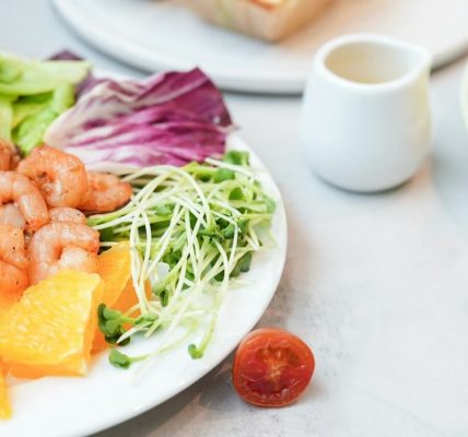 Shrimp salad with fresh vegetables looks delicious